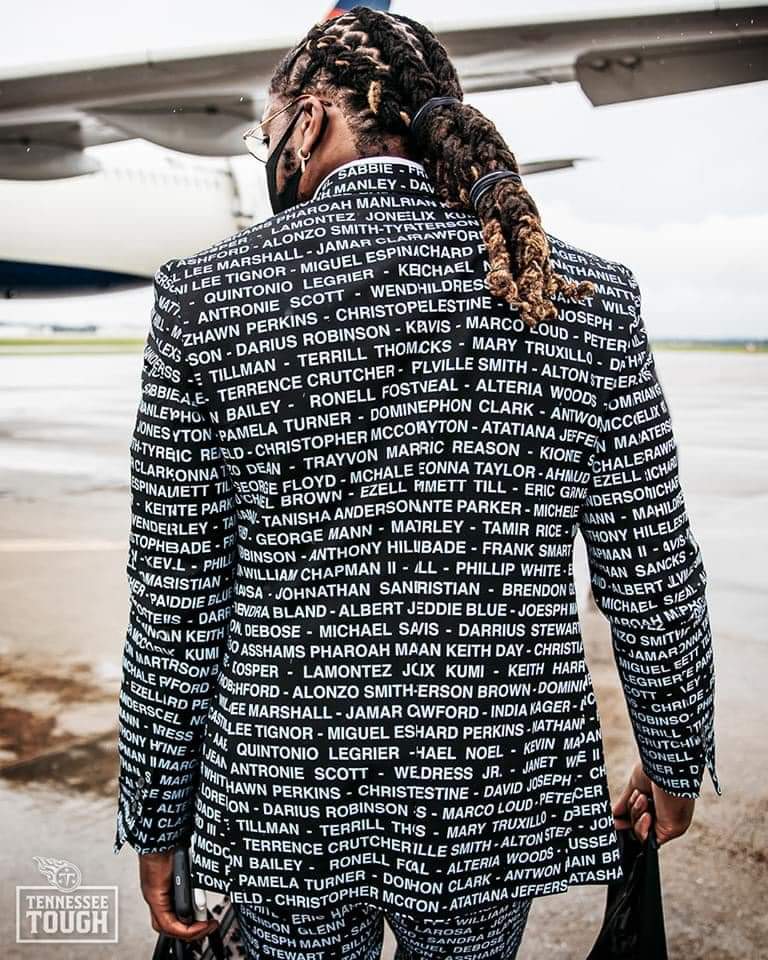 clarencehilljr's tweet photo. Derick Henry, star running back for the Tennessee Titans, touched down for today's game wearing a suit with the names of African Americans killed by police https://t.co/AaqYty1R1E