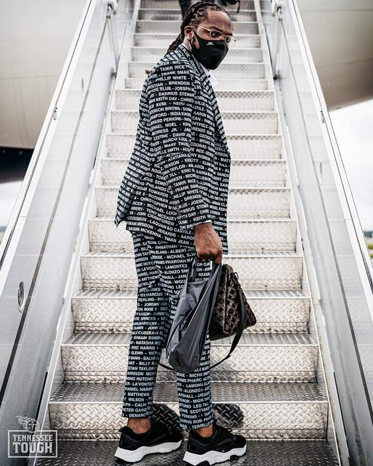 Derick Henry, star running back for the Tennessee Titans, touched down for today's game wearing a suit with the names of African Americans killed by police