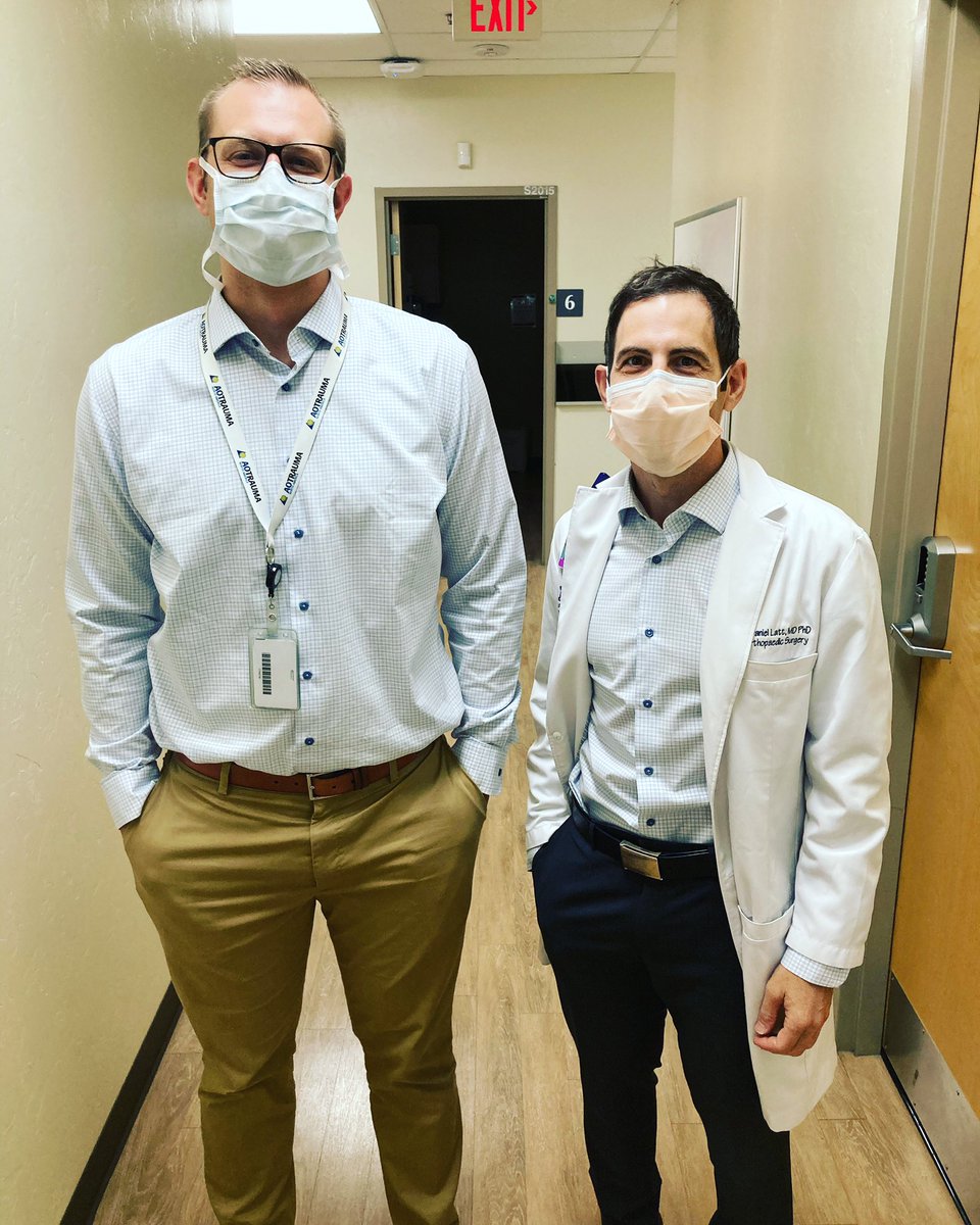 Uazorthopedics's tweet photo. What happens on Monday morning when the resident and attending physician wear the same shirt?? We ask who wore it better??? #doctorproblems #whoworeitbetter @lattld https://t.co/SVMlgmVUtQ