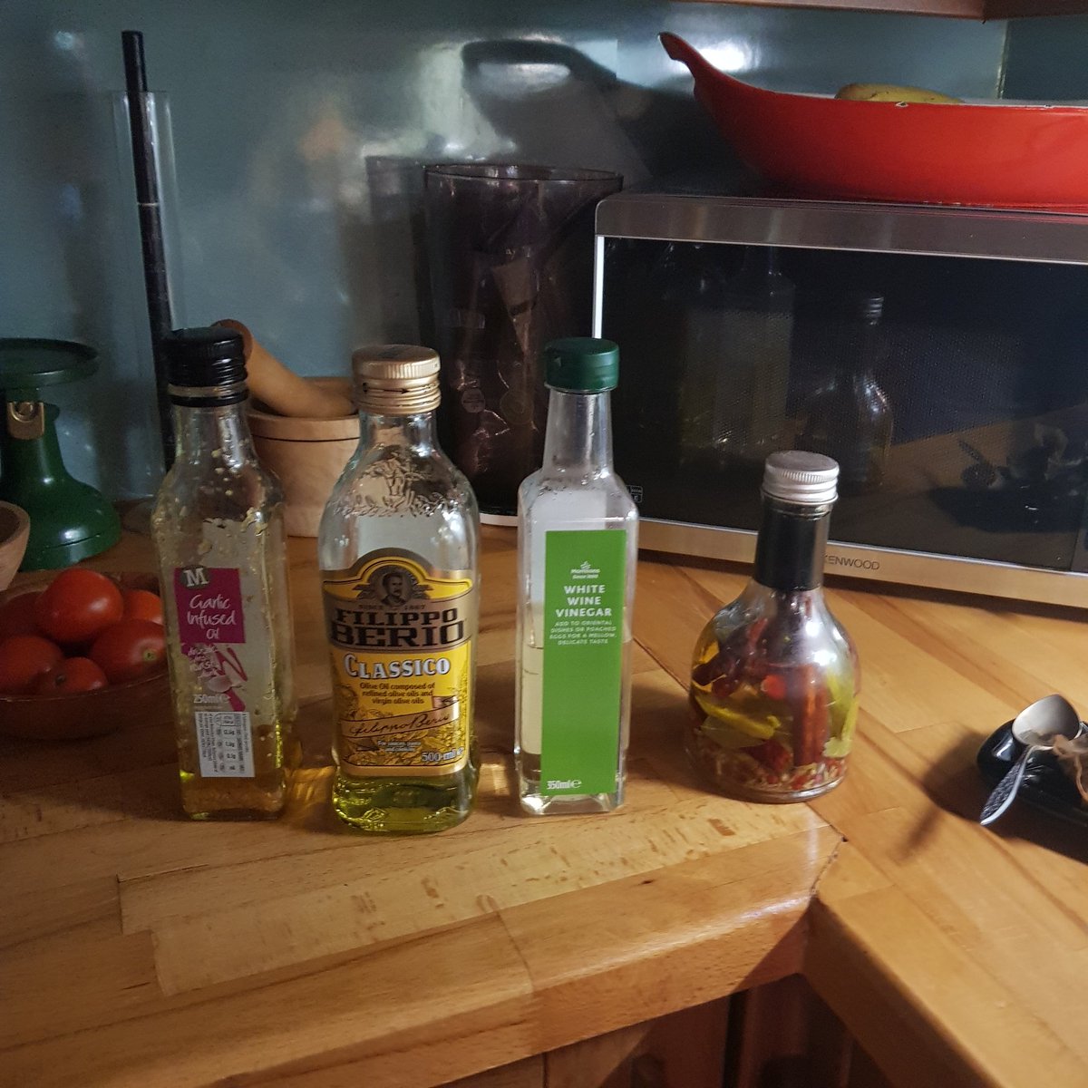 I have absolutely no idea at this point what is about to go into this dressing, but the bottle on the end has been knocking around long enough to need using, and it appears to have chilli's in it so what could go wrong?