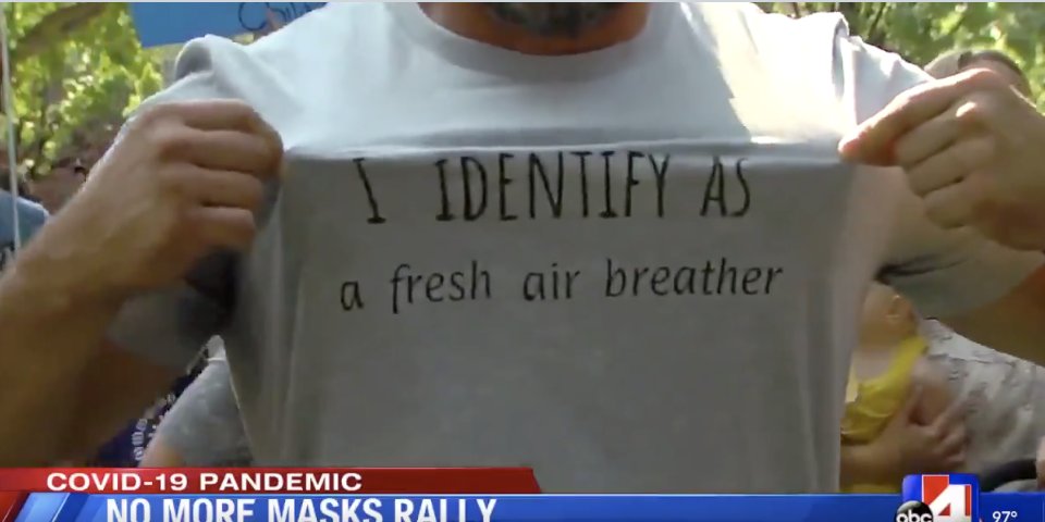 wyshynski's tweet photo. Please remember that protests like this are a symptom of a larger, years-old movement that ignores empathy and embraces egocentrism, for the sake of "owning" people they dislike. There isn't an ideology to argue against. Making you argue *is* their ideology. TLDR, this shirt. https://t.co/FD22M6Ak1U