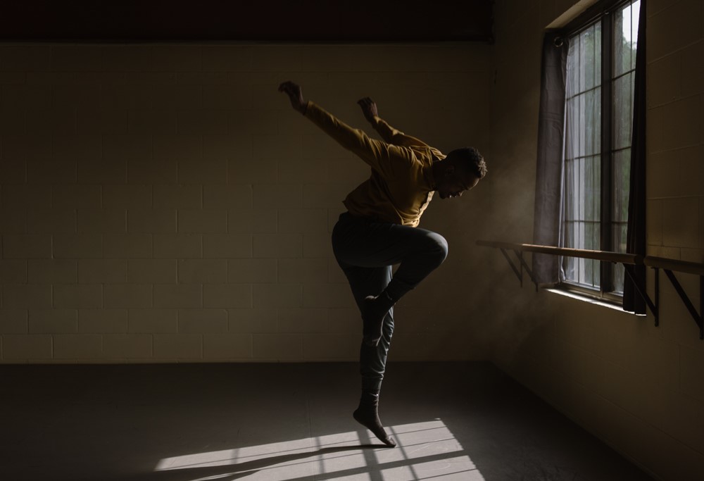 RangefinderMag's tweet photo. Protests were just percolating nearby when LeeAnn B Stephan photographed portraits of Michael, a dancer. "This one felt the most raw—a very real moment where his body seemed really suspended in light and time," she says. "It was incredibly moving to watch him that day." #RfPOTD https://t.co/mGWdO7Nb8P