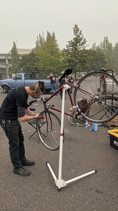  @VetsWall and Casey from Custom Bicycle Works are out back repairing bikes for those in need.