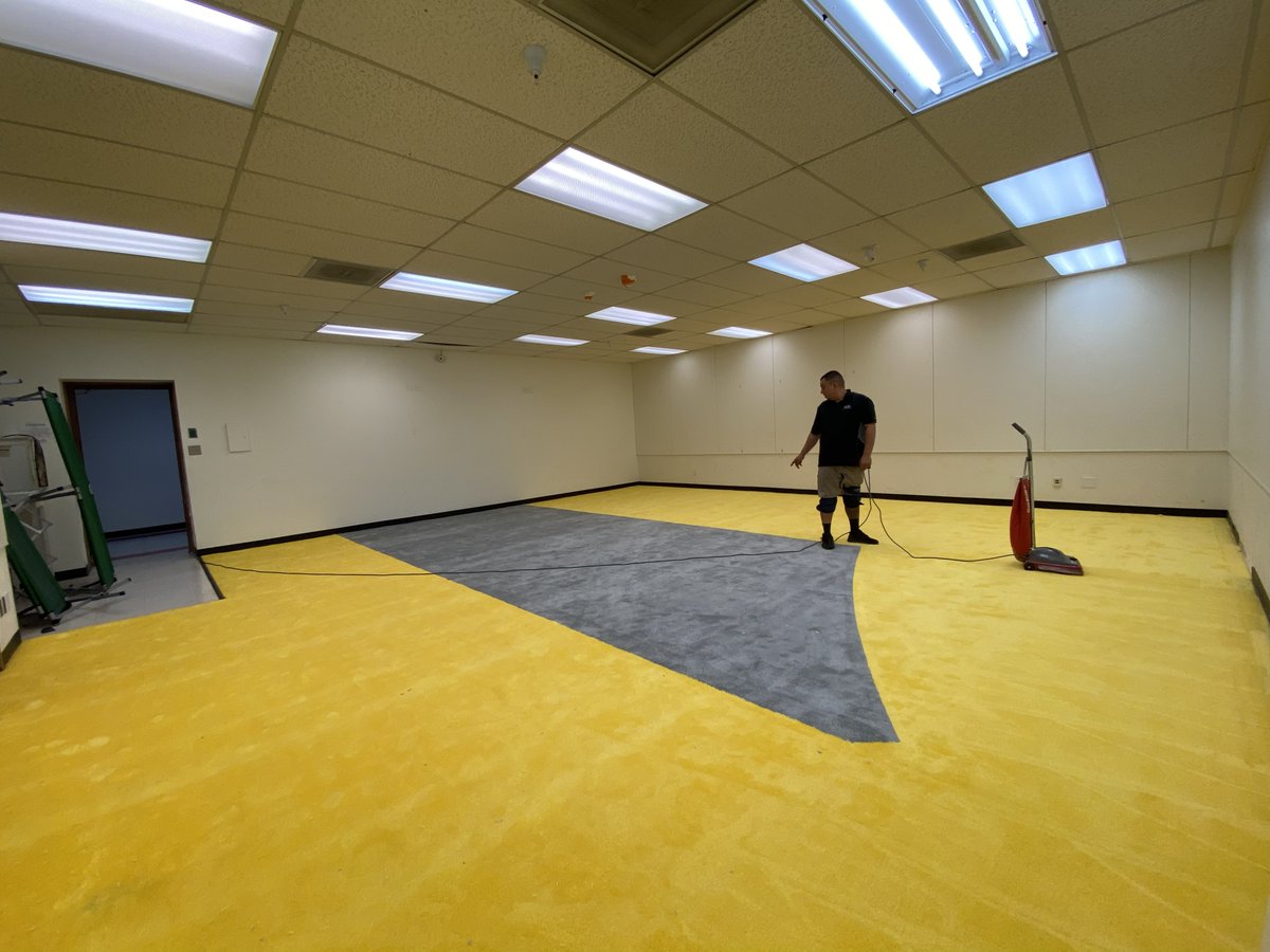 Zendesk's tweet photo. When you cancel your user conference, what do you do with all the unused carpet? ♻️

@ZendeskImpact put #ZendeskRelate carpeting to good use. It was shipped &amp; installed in the @RESCUEorg welcome center, a space to give respite to families recently released from @ICEgov detention. https://t.co/gBGkRxixkb