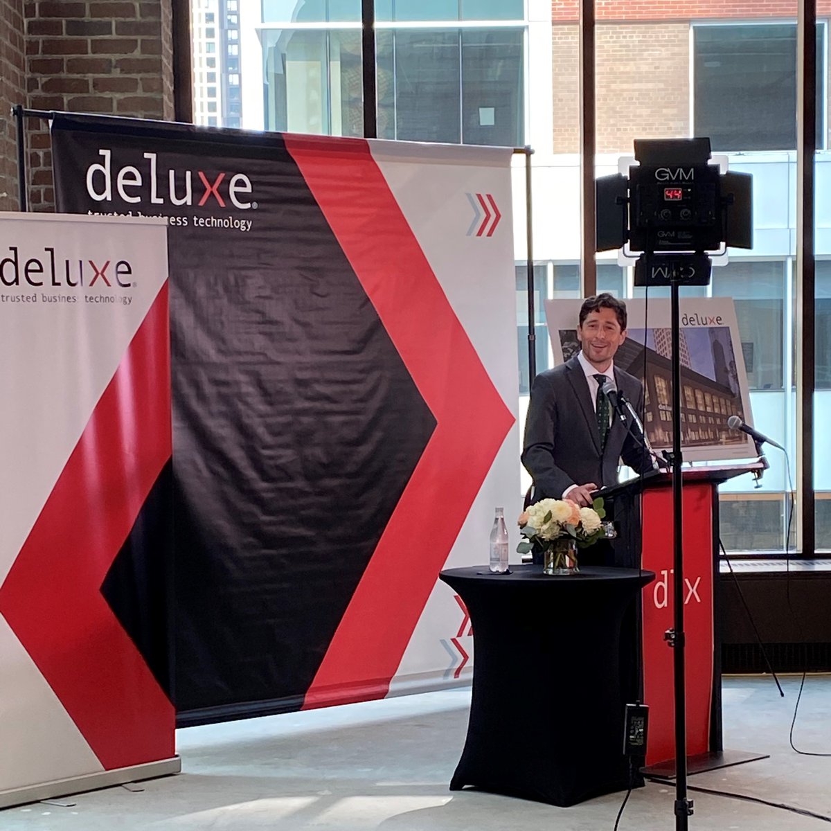 Deluxe's tweet photo. This afternoon, we announced we are moving our headquarters to downtown Minneapolis. Pres. &amp; CEO @BarryDeluxeCorp, @GovTimWalz, Mayor @Jacob_Frey and others spoke at a news conference about what the move means for the city, the state and Deluxe itself. https://t.co/sK5J63i2bH