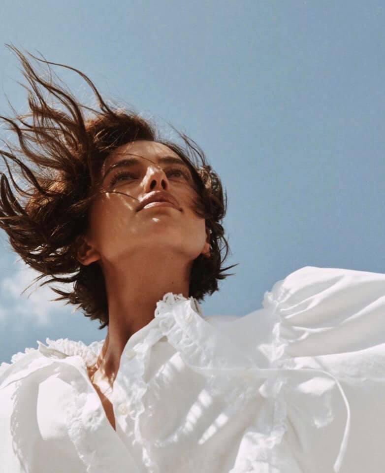 New: Irina Shayk looks ethereal in white for Vogue Russia's