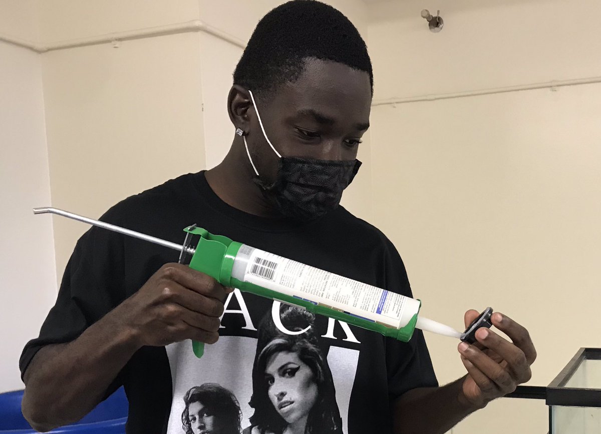 KResearchLab's tweet photo. Mario Watson is a junior Integrated Environmental Science major @bethunecookman studying on the impacts of ocean acidification on seahorse ossification, also known as bone development. Today Mario learned how to install bulkheads. Stay tuned for updates on this great project! https://t.co/s28gm0uMM9