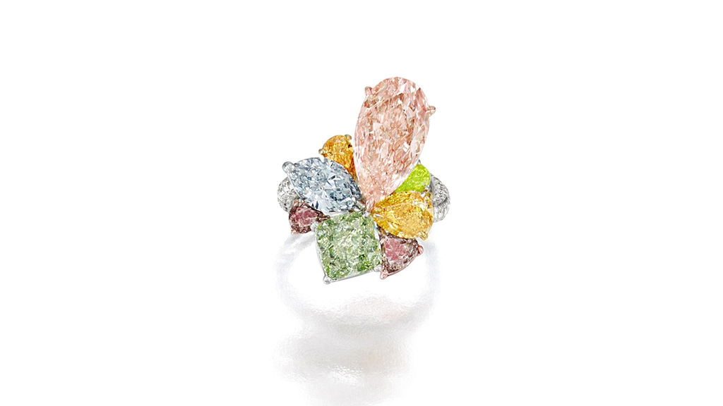 GIAnews's tweet photo. Featuring 8 natural fancy color diamonds, this ring shows the rainbow colors that diamonds can come in. Each diamond color is caused by a different factor, such as element impurities, radiation and crystal lattice distortion. Courtesy: Sotheby's https://t.co/cdpPobNumS