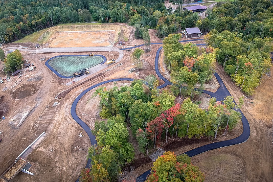 SkiVanHo's tweet photo. We started paving sections of our new trails for elite training and public roller skiing! ⁣
⁣
Also, featured in the first photo, the first glimpse of our new biathlon range, including the penalty loop! https://t.co/qHPgSCzPc9