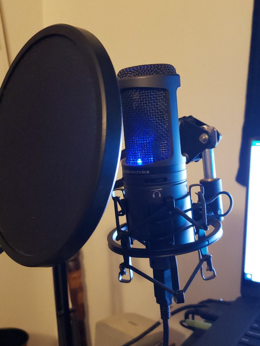 Here is my setup. A mic and the pop filter. I also have my mic on an arm so that i can touch my desk without extra noise. But you don't need that and its only like $15-30