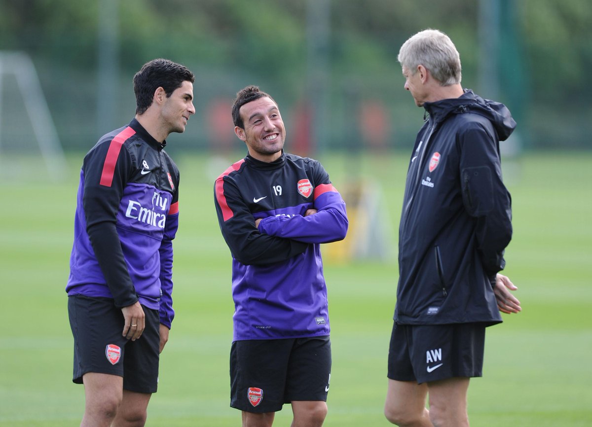 Stuart_PhotoAFC's tweet photo. 8 years ago today. Arsenal manager Arsene Wenger talks to Mikel Arteta and Santi Cazorla before training. #wenger #arteta #cazorla #arsenal https://t.co/HVycvCtTws