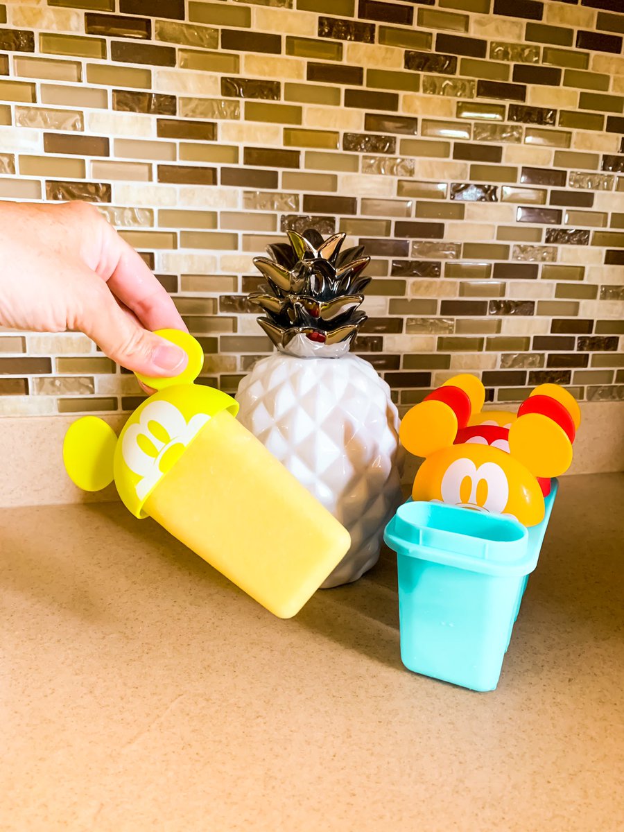 disneykidsblog's tweet photo. Over the weekend we made some Pineapple pops!! We had these cute Mickey popsicle molds and wanted to make a frozen treat with them!! 
🍍🍍
What’s your favorite frozen treat? 
🍍🍍
#disney #disneykids #disneykidsblog #wdw #disneyfamily #shopdisney #pineapple #pineapplepop https://t.co/7WRzGRn8Gg