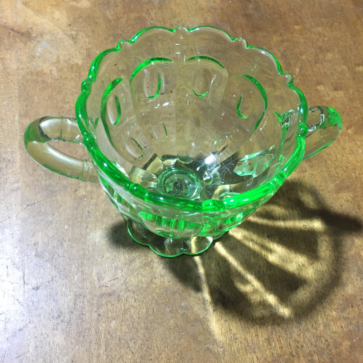 The issue for the LHS is: how do I evaluate the story when there's no makers marks & no oral history to connect /any/ of the pieces?! This might be 1930 Vaseline glass piece, or it might be a 1990 reproduction. Finding an expert who could tell very likely means time & money.