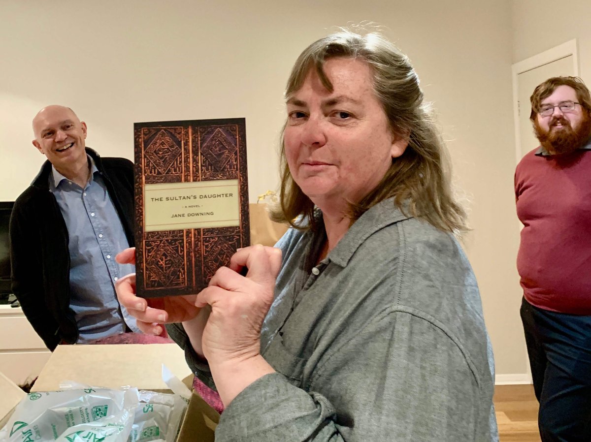 obiterpub's tweet photo. Family and friends on hand with champagne as Jane Downing opens a box of her just-published novel ‘The Sultan’s Daughter’. We now declare it launched! #BookBoost #ozlit #WritingCommunity https://t.co/xDvQkxSfwY