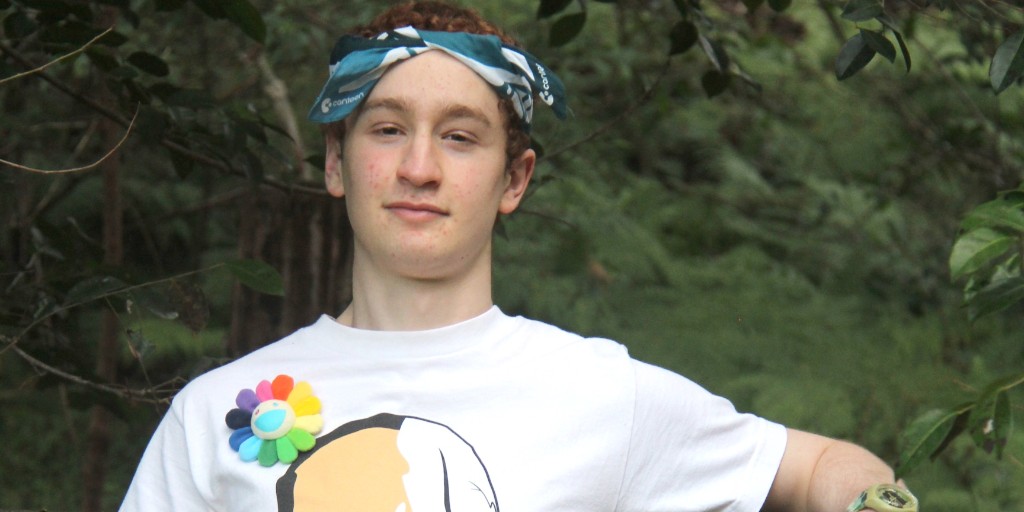 "It reflects youth culture with an anti-cancer attitude and is my seed of optimism, planted in the hope that it will blossom into wellbeing for the next generation." This is the story behind Josh's new bandanna design 'Steez'.  💚 Check out the new design: bit.ly/2ZFEGFA