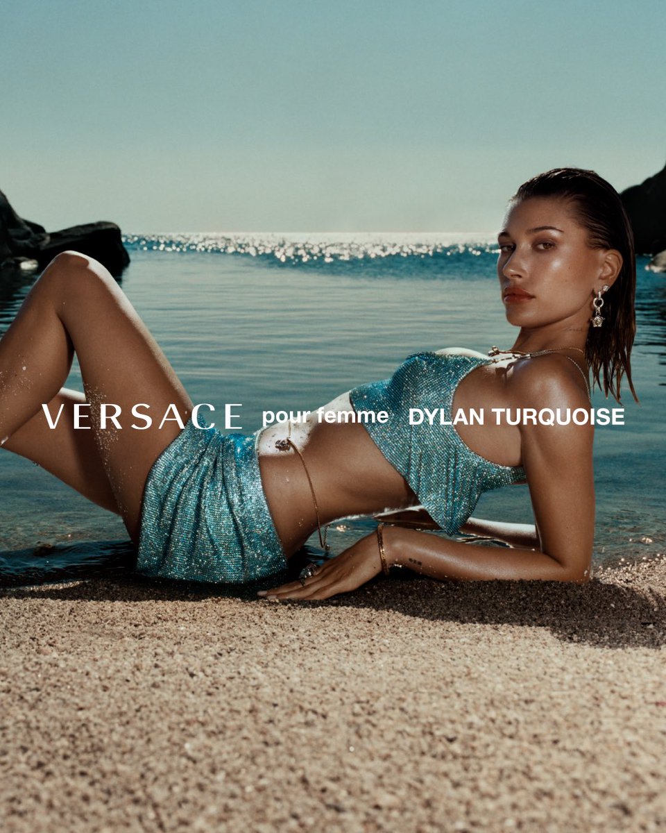Versace's tweet photo. Dylan Turquoise Pour Femme 🐚 introducing the new fragrance for her. #HaileyBieber encapsulates the young and effortless attitude of today’s Versace girl as she shimmers on the shoreline. #VersaceDylanTurquoise

View more: https://t.co/3hPV8MbGJr https://t.co/5jNXryxuyI