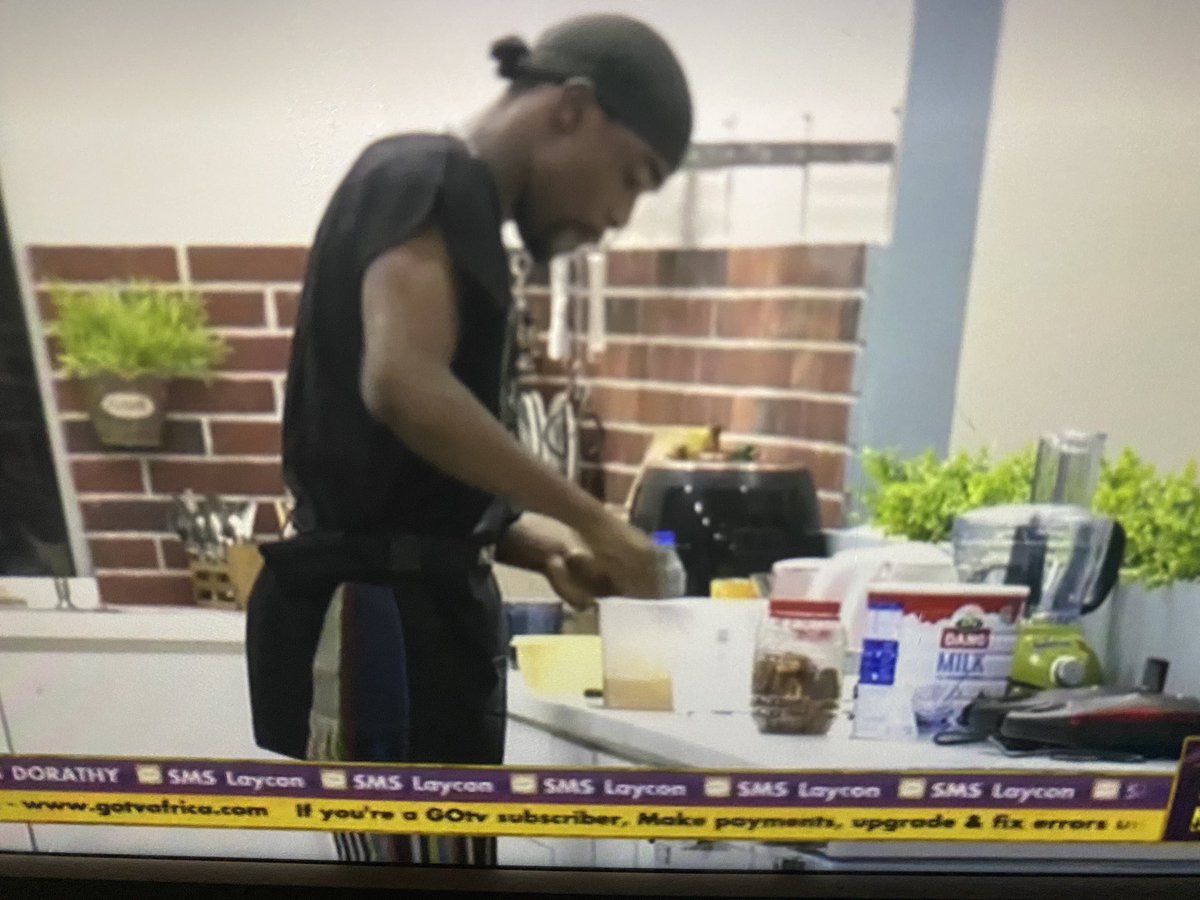 Stan4life2's tweet photo. Even while making akara for the whole house, Neo has his beloved @danomilk_ng by his side. #ManLikeNeo #BBNaija https://t.co/FGfrvo11kD