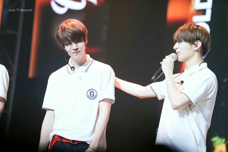 Golden Child looking at each other; a thread