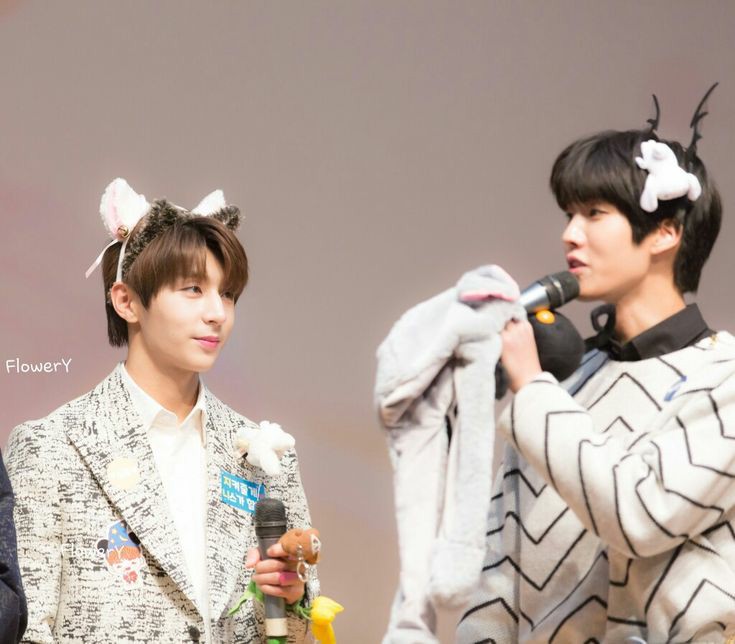 Golden Child looking at each other; a thread