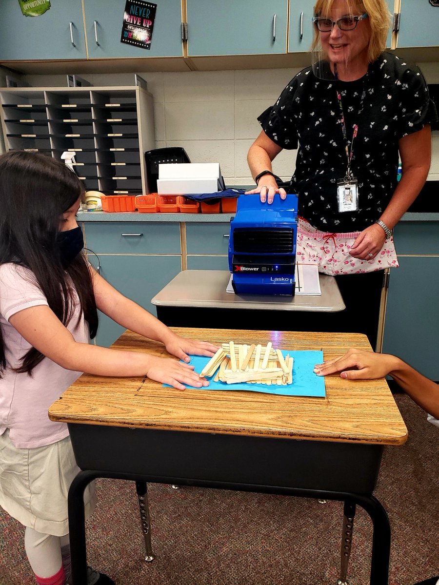 First Grade students are learning about structure and function. They reconstructed a "3 Little Pigs" home and then tested their durability. PLTW teacher, Mrs. Day, serves as the "Big Bad Wolf".