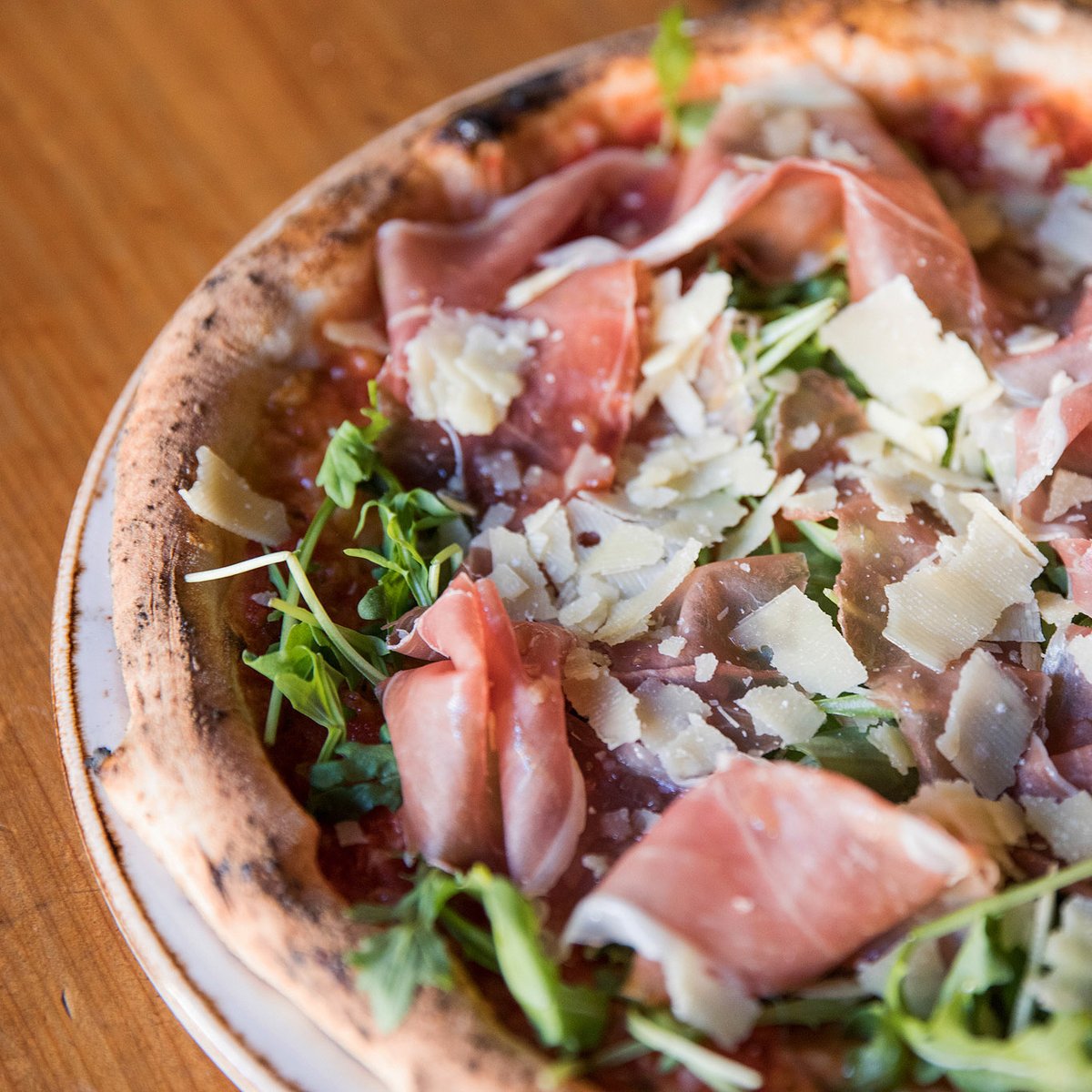 "I just want to be in my sweats, walk my dog, watch tv and eat pizza." - America Ferrera. Wish granted. 

Our #pizza italiana is pure comfort, topped with prosciutto di parma, organic arugula, creamy crescenza &amp; parmigiano reggiano.

#takouttuesday #comfortfood #napavalley