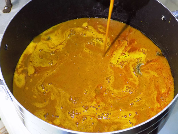 6. The liquid strained after pounding is boiled for some minutes. The ingredients needed to give it that peculiar taste and aroma are then added to the broth. The liquid is allowed to boil till it thickens.The soup could now be said to be ready for consumption.