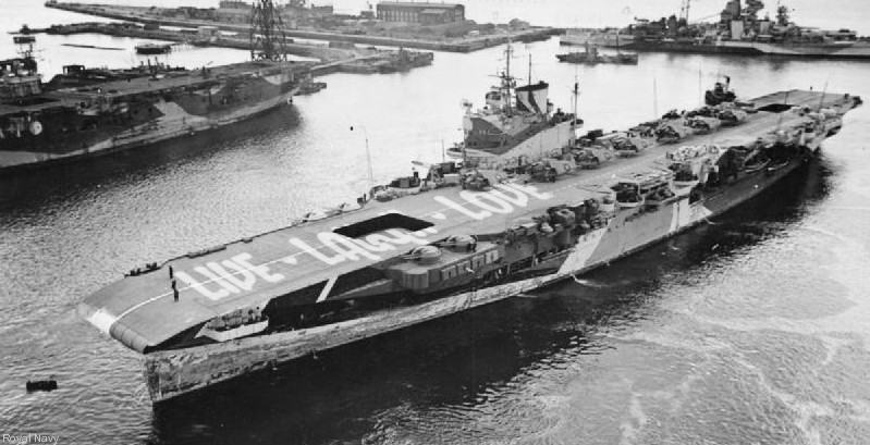 And here's HMS Illustrious with her flight deck emblazoned with a joyous 'Live - Laugh - Love'.