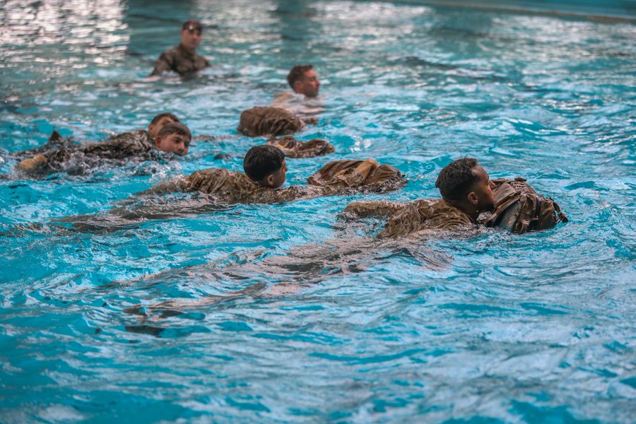 12thMCD's tweet photo. As part of an amphibious, expeditionary fighting force, confidence in the water is key to winning our battles. Marines maintain their skills through swim qualification, a test performed in uniform in depths of a swimming pool. #12MCD #usmc #Marines #winning #swim #amphibious https://t.co/3To9rcWjlK