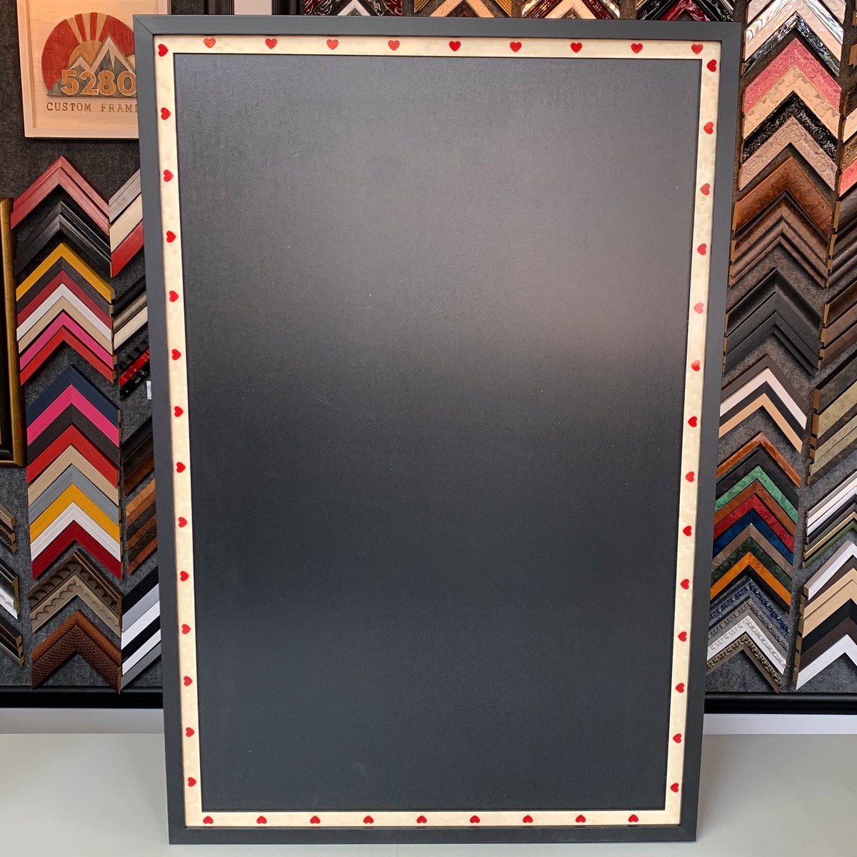 5280customframe's tweet photo. โค๏ธ Chalkboard custom framed using a black wood frame stacked on top of a @BellaMoulding frame with hearts! #art #denver #colorado #pictureframing #customframing #5280customframing #chalkboard #framedchalkboard #stackedframes https://t.co/85SoWNxCU2