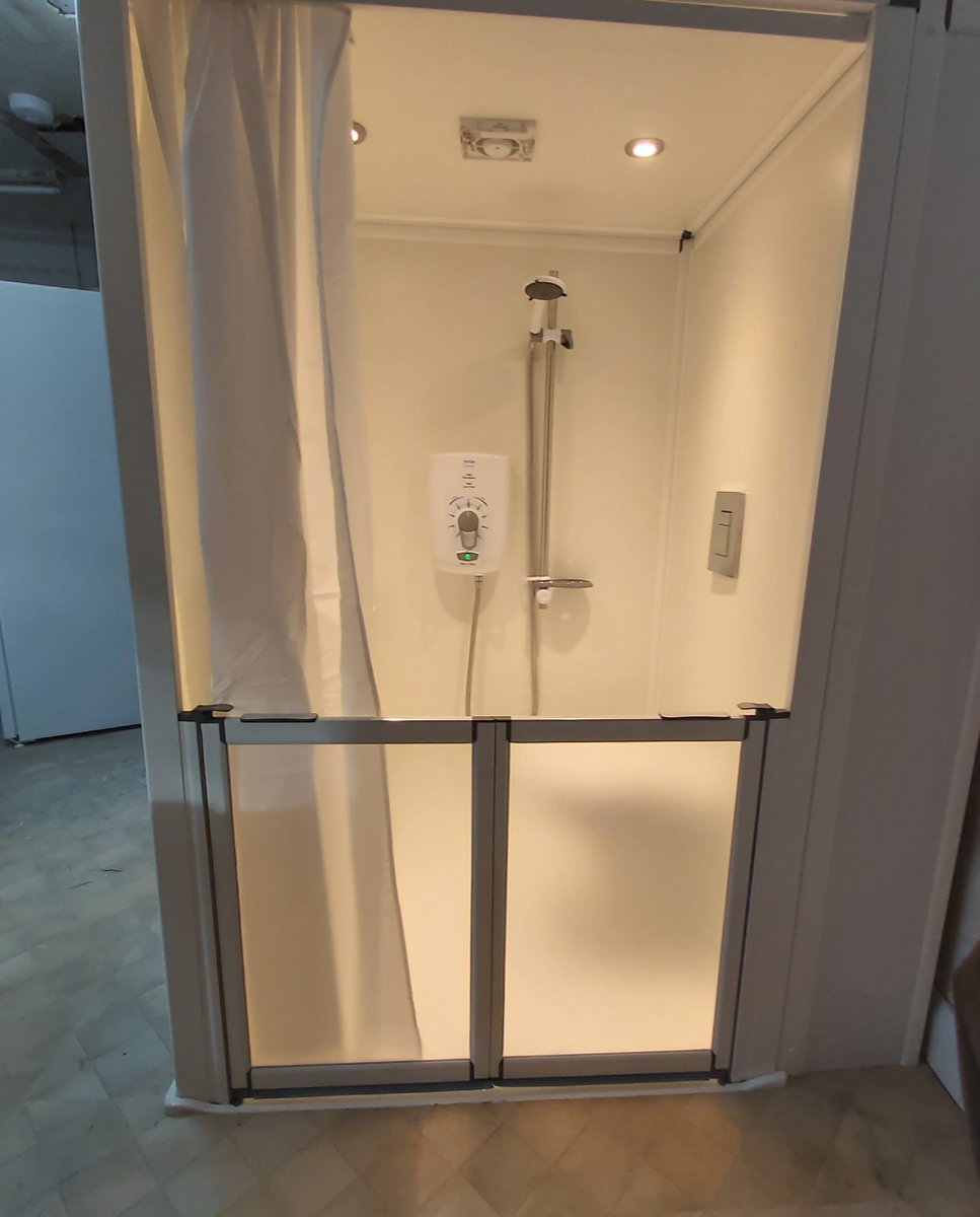 Bickfordpod's tweet photo. Pics of our shower pod with wash hand basin and toilet installed in Birmingham, this was installed two days before the UK lockdown in March. Previous to the install the elderly service user had no access to a showering facility, she now has the shower pod and bed in the same room https://t.co/nYdUiQ9Vqk