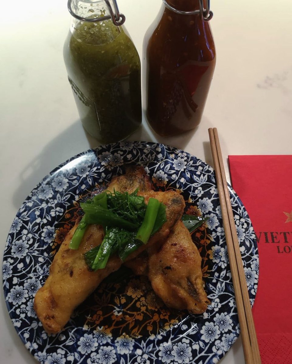 Our delicious fried wild sea bass, topped with a traditional touch of banana leaf. 🍌