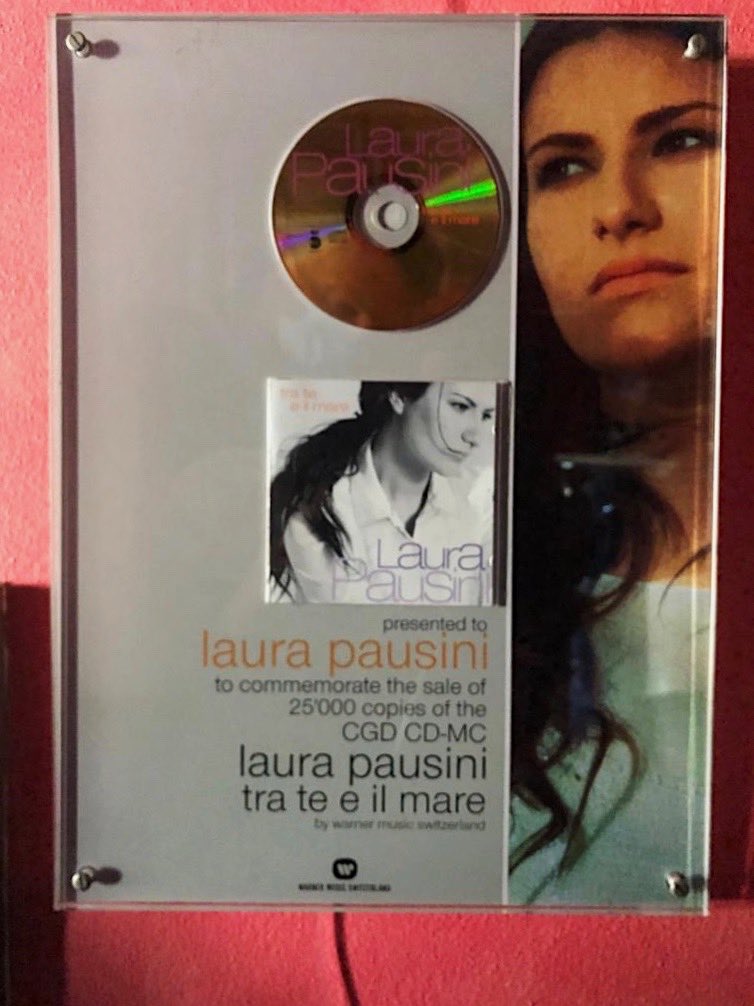 Laura4uOfficial's tweet photo. Queste sono solo alcune delle certificazioni da tutto il mondo dell’album #TraTeEIlMare, che oggi compie 20 anni. Sono tutte qui, nella sede del nostro fan club a Solarolo. Oggi riascoltatelo tutto e diteci qual è la vostra canzone preferita del disco! 
#TraTeEIlMare20 https://t.co/BmIS30g9AK