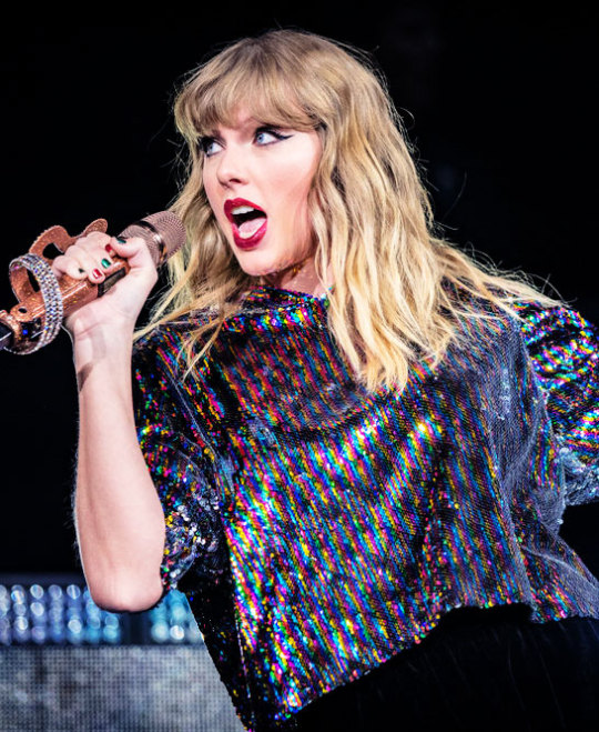 Taylor performing on Hollywood Boulevard for Jimmy Kimmel.