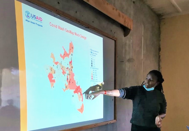 AfyaUzazi's tweet image. #Leveraging #spatialtechnology for #COVID-19 response. Beatrice Akeyo of USAID&apos;s @AfyaUzazi explains geomaps that the program has developed to improve the coordination of #WASH interventions in Nakuru County. @fhi360 @USAIDKenya @NakuruCountyGov  @MOH_Kenya #komeshacorona