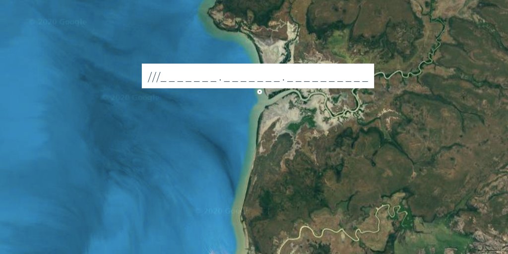 Aerial view of land and sea. sea stretching out to the left, point on map labelled ///_______._______.__________