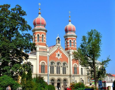 The Great Synagogue was built in 1892 in Plzeň, Czechia.It can seat 2,000 people, making it one of the largest synagogues in the world.The city council forced the towers' design to be shortened so the a nearby bishop would not get envious.