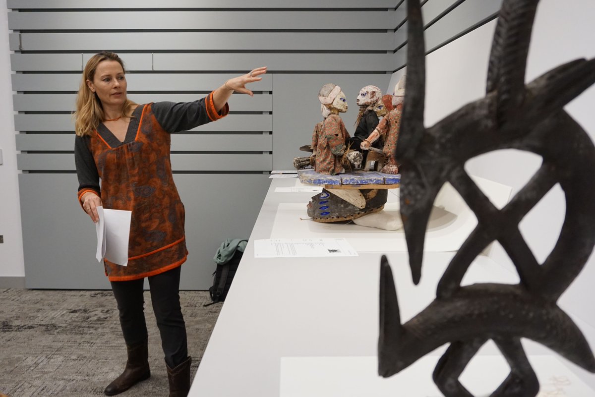 HoodMuseum's tweet photo. #TBT: Anthropology Professor Sienna Craig teaching from objects in the #HMAPermanentCollection in the Bernstein Center for Object Study. https://t.co/ws2eOLkcDB