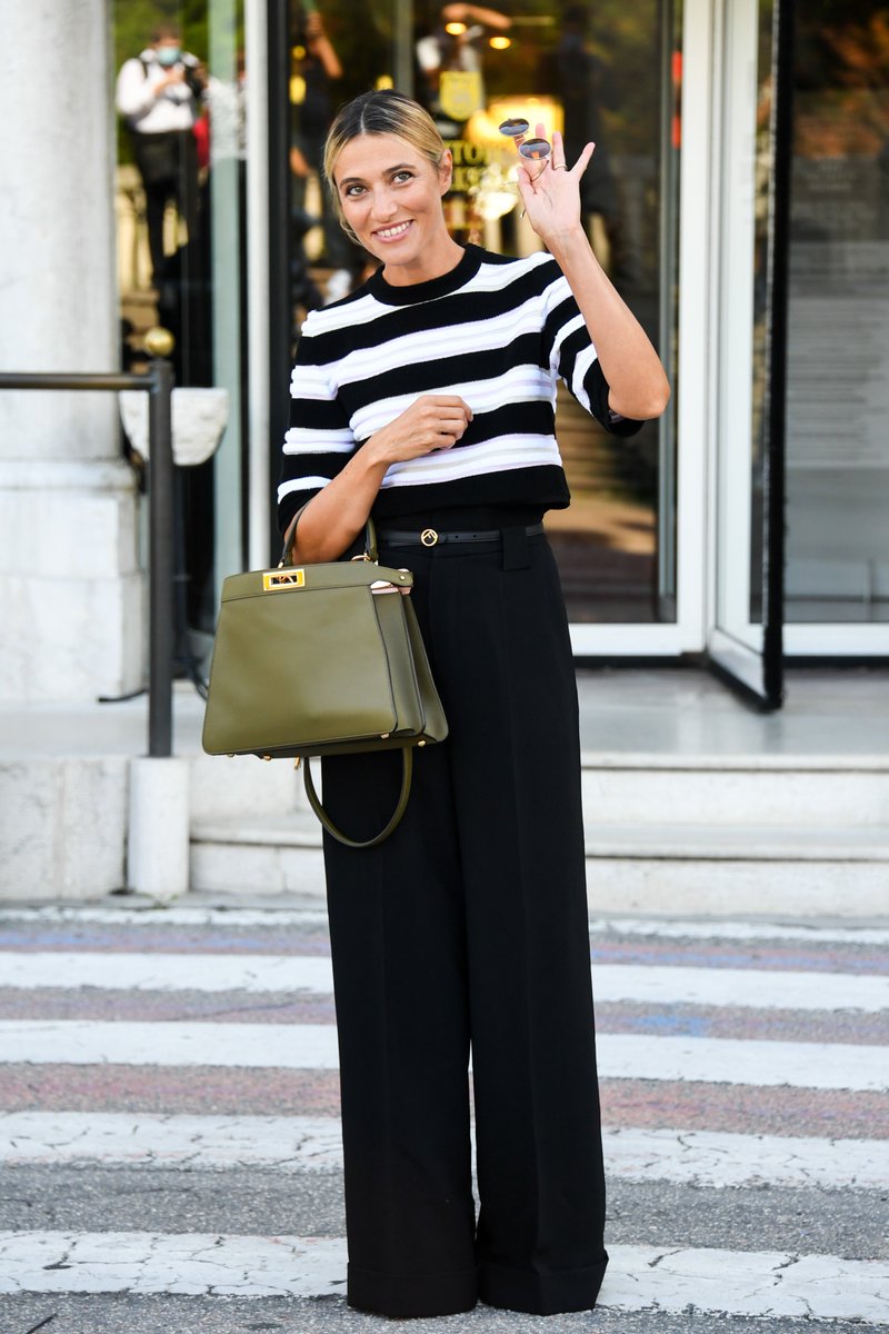 Fendi's tweet photo. Italian actress Anna Foglietta, Godmother of the 77th Venice Film Festival in a #Fendi total look with the new iconic #FendiPeekaboo.
#BiennaleCinema2020 #Venezia77 #FendiPreFall20 https://t.co/mdeXumkBZ8