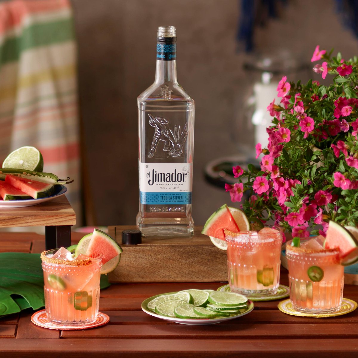 Important announcement: This WILL be the prettiest drink you ever make.

El Jimador Watermelon Picante Punch

10 oz el Jimador Silver/Blanco Tequila 
10 oz Watermelon Juice
15 oz Lime Juice
3.75 oz Simple Syrup
Jalapeños
Watermelon
 Lime Wheel