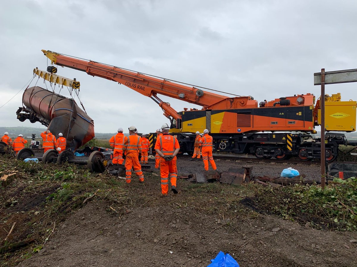 NatResWales's tweet photo. Work continues near Llangennech with the lifting and removal of the derailed wagons by crane that started yesterday. It’s expected that all the wagons will be removed by the beginning of next week https://t.co/6Np7wHXSDO https://t.co/ij5susSDeu
