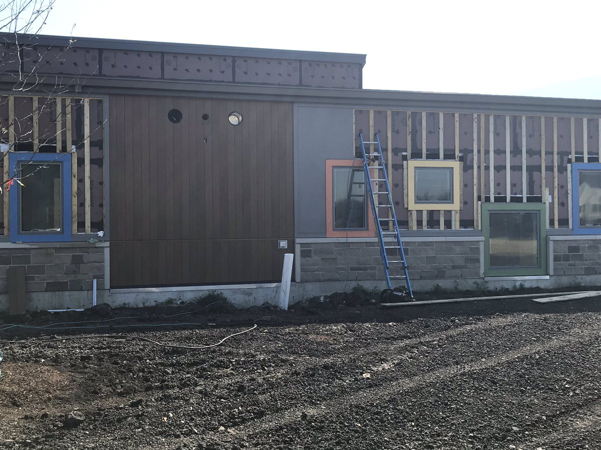 Siding has started at the Early Learning Center.