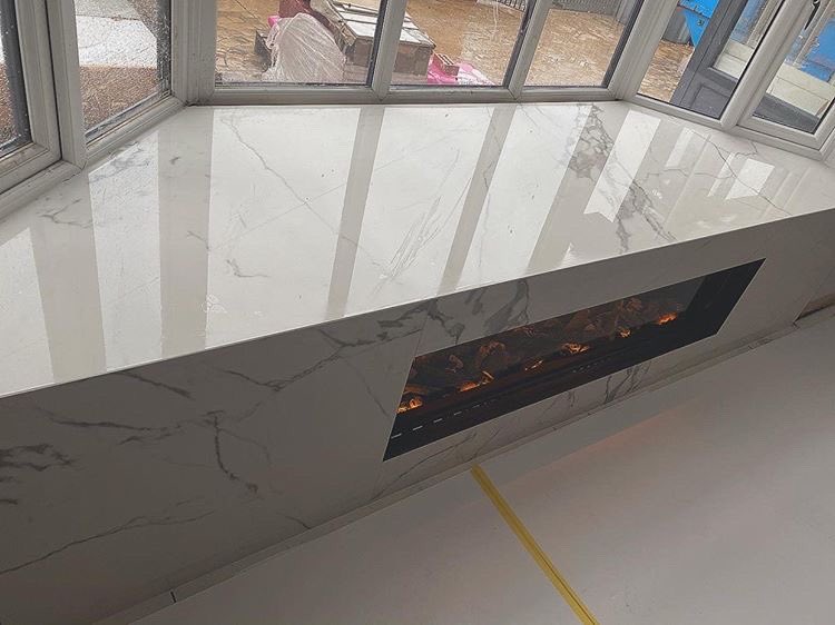 Evonicfires's tweet photo. Just wow ππ₯π Check this out from @sktiling Our e1500gf expertly installed into a window bench with marble surround. Never seen this type of install before, but it certainly looks impressive π @evonicfires #fireplacesurround #fire #marblesurfaces #fresh #style #interiordesign https://t.co/wKi5NmsVuS