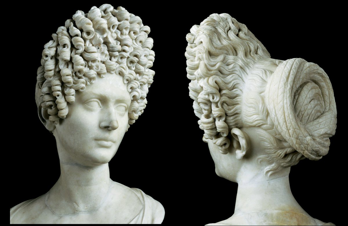 The hairstyles from the Flavian and Antonine era are the most famous and elaborate. Cypriote curls became a must: masses of shaped curls like arching crowns, done by aid of fillets of wool and toupees. The rest of the hair was braided in an rbis comarum, a fancy bun 6/?