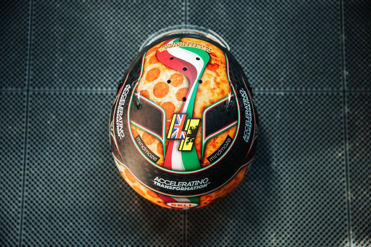 ESPNF1's tweet photo. Lando Norris has really got a pizza helmet for the #ItalianGP 🇮🇹🍕 https://t.co/qcDdPcI3Ez