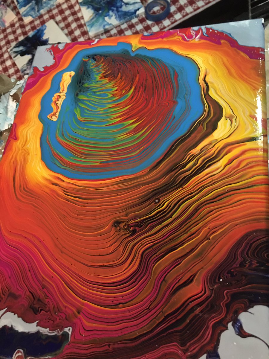 pourraine's tweet photo. Having some fun with left over paint. #paintpouring #ringpour https://t.co/vzy09rLh7V