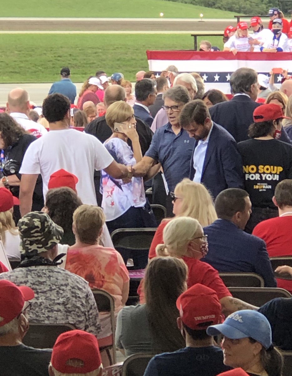 Former Energy Secretary  @GovernorPerry mingling in the crowd, shaking hands, hugging people and posing for pictures shoulder to shoulder. (All things the CDC recommends against during a pandemic)