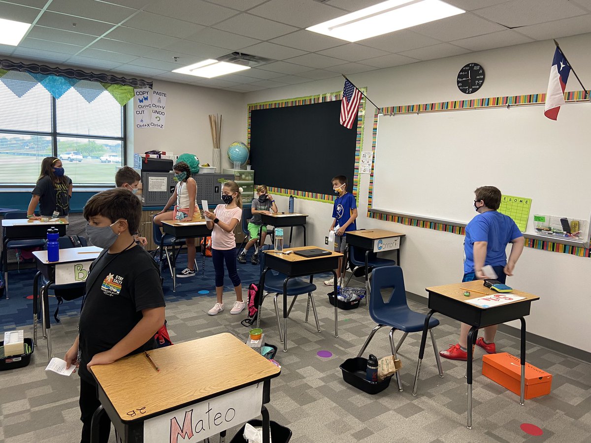 angelaatkagan's tweet photo. First day of in person school success! The desk may have been apart, but my class definitely worked together today! We quizzed our partners before our spelling test today, even with masks on. I am so excited to be their teacher. #mrspink4thgrade @KaganOnline #shoulderpartners https://t.co/CUN3ZYlJ5O