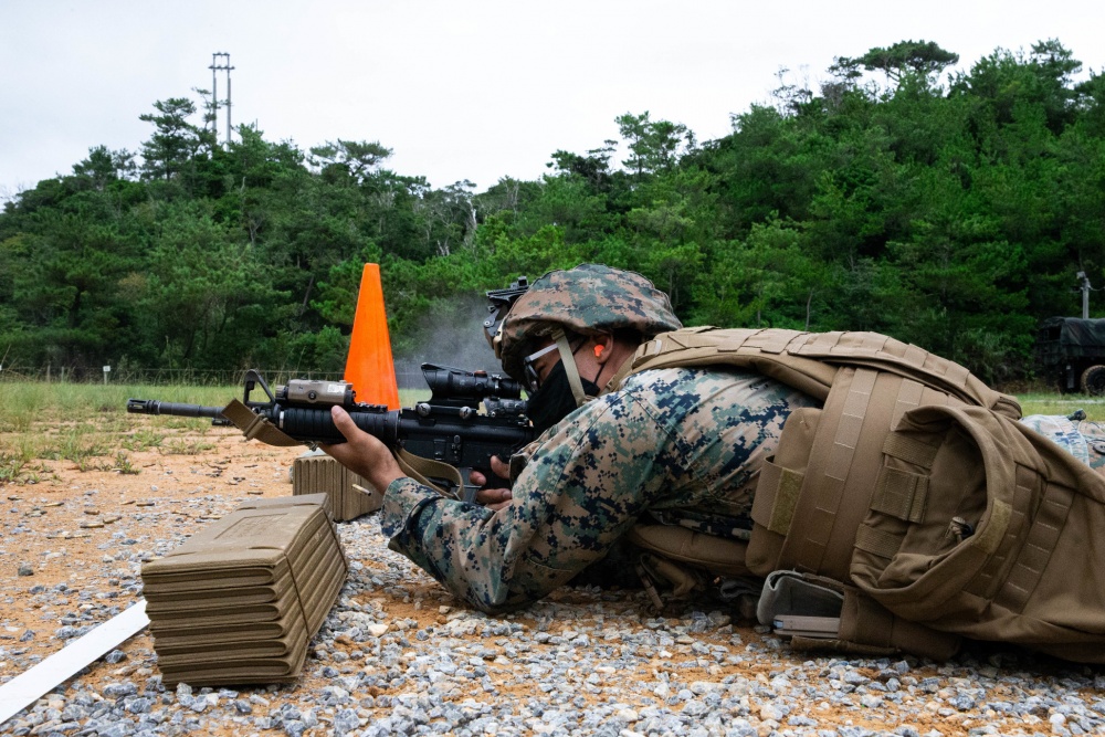 USPACOM's tweet photo. U.S. @PacificMarines with Truck Company, Headquarters Battalion, #3MARDIV, fire an #M4 service rifle during a close-quarters range on Camp Schwab, Okinawa, Japan. #SemperFi #Lethality #FreeandOpenIndoPacific. https://t.co/EHZY2MKcBy