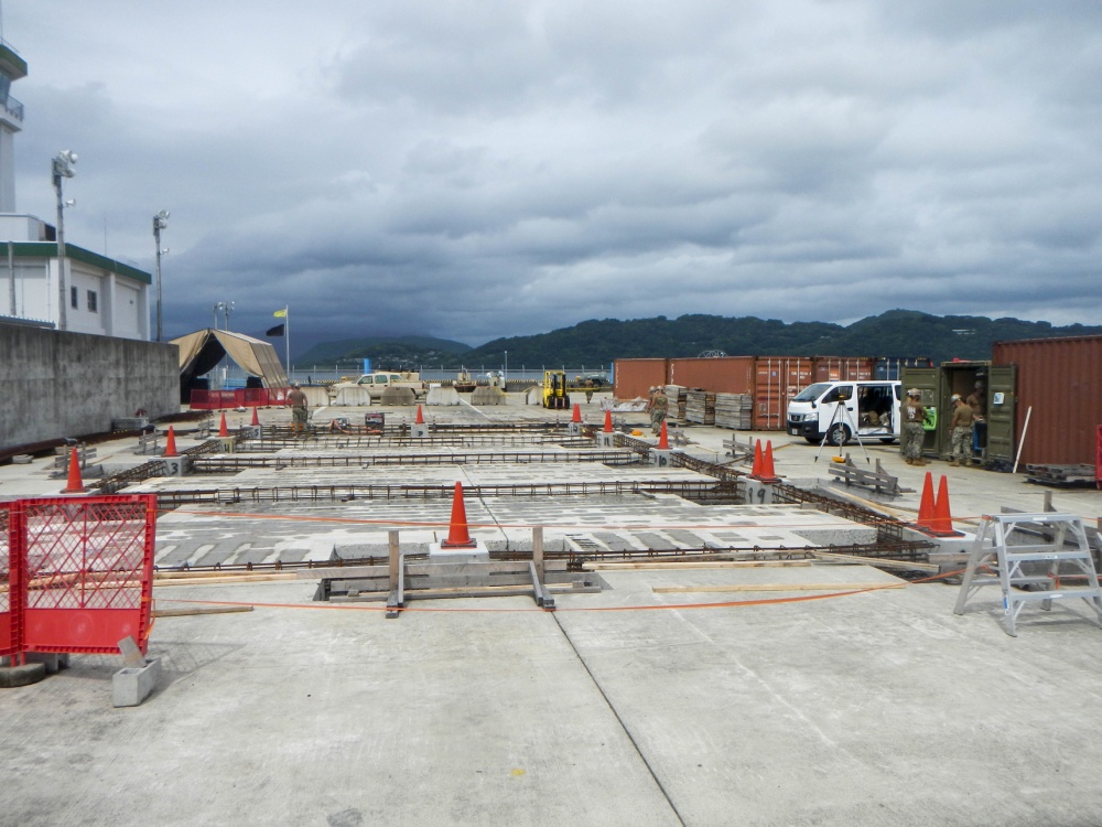 USPACOM's tweet photo. Seabees assigned to U.S. Naval Mobile Construction Battalion #NMCB3 are constructing two pre-engineered buildings that serve as a vehicle storage house and a maintenance facility in support of Naval Beach Unit #NBU7 on board @CFASasebo. #ForgedBytheSeabees #FreeandOpenIndoPacific https://t.co/C5RtqJU1E0