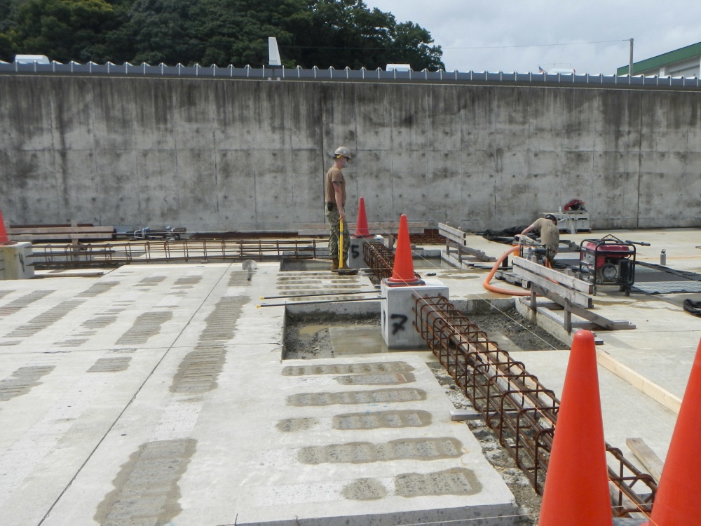 USPACOM's tweet photo. Seabees assigned to U.S. Naval Mobile Construction Battalion #NMCB3 are constructing two pre-engineered buildings that serve as a vehicle storage house and a maintenance facility in support of Naval Beach Unit #NBU7 on board @CFASasebo. #ForgedBytheSeabees #FreeandOpenIndoPacific https://t.co/C5RtqJU1E0